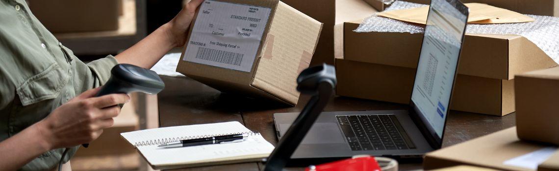 Business owner packing online orders